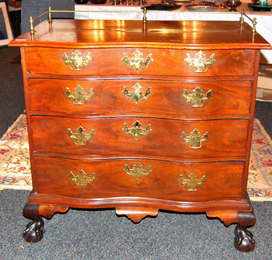 A Salem Chippendale mahogany oxbow bureau on claw and ball feet went to an area dealer for $6,900. The chest, circa 1760‱780, came from the estate of Mayflower descendent Eleanor Wiles of Medford, Mass.