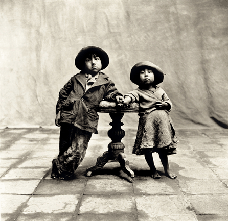 Irving Penn (b 1917), "Cuzco Children,†1948, platinum palladium print, printed 1971, signed, numbered "16/60†in pencil, typed "Condé Nast†copyright credit reproduction label affixed and edition stamp on the reverse of the flush-mount, 19 1/8 by 19¾ inches, sold for $529,000 (world auction record for the artist).
