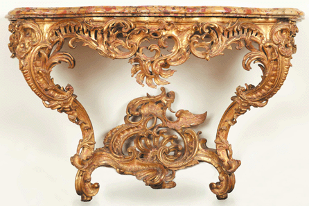 An elaborately decorated giltwood and marble console table, circa 1735‴0, was made in Paris by an unknown artist.