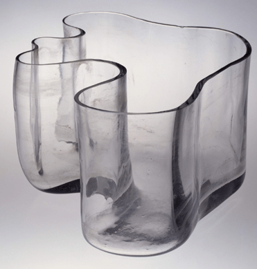 Alvar Aalto designed the mold blown glass Savoy vase for Karhula Glassworks in Finland in 1936. Its sinuous lines hearken back to the rococo.