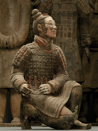 Kneeling Archer, Qin dynasty (221′06 BC), clay with pigment, height 49¼ inches, width 29 1/8  inches, excavated in 2001 from Pit No. 2, Museum of the Terra Cotta Warriors and Horses of Qin Shi Huang, Lintong. ₩Wang Da-Gang photo