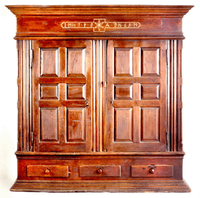 The largest piece of furniture in the sale, this Lancaster County, Penn., walnut schrank, circa 1769, measuring 81½ inches tall and 78 inches wide, sold for $70,200. It retains the original rattail hinges and an old, if not original, surface. It fell within the $60/$90,000 presale estimate.