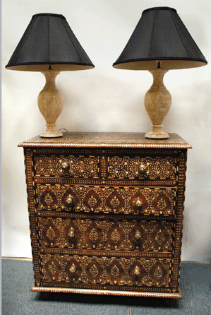 Fair Trade, Shelburne Falls, Mass., showed a bone inlay chest from the Twentieth Century.