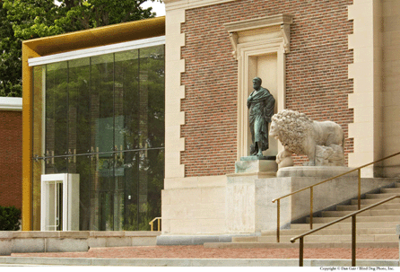 Combining the old and the new, the original façade and statuary contrast with the new glass addition to the Bowdoin Museum of Art. ₩Blind Dog Photography