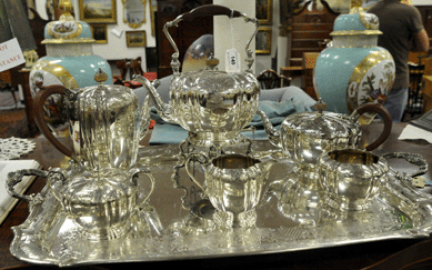 A marked Tiffany silver tea and coffee service went out at $8,050.
