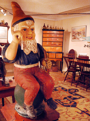 A tobacco store figure, late Nineteenth Century, welcomed visitors to the booth of Tucker Frey, Woodbury, Conn.