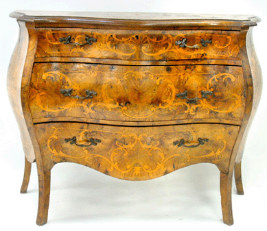 A Continental bombe three-drawer chest realized $1,380 from a Maine dealer.