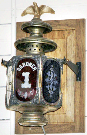 The circa 1880‹0 engine lamp with six etched panels †the red front panel reads "Gardner 1††that was taken from the Fire Museum sometime during April. 