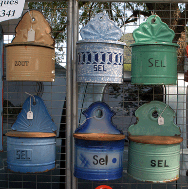 European enamelware, primarily from France, such as this grouping of salts, was on view at Harry & Ginny's Antiques, Brookhaven, N.Y.