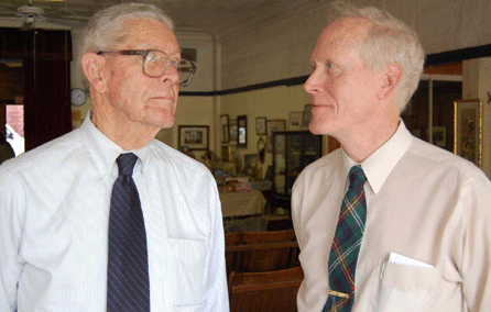 Father and son, Robert Cann and Robert Cann Jr, contemplate the gallery during the final sale preview.