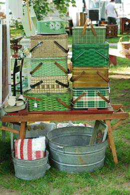 From Fairfield, Conn., Pauline Schlatter and Kim Watkins of Rooster Antiques offer a stack of early picnic tins.