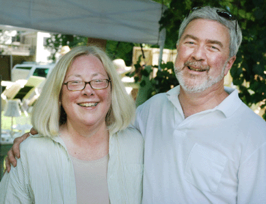 Judy Groppa, director of the Darien Historical Society, with Brian Ferguson of Ferguson & D'Arruda, show managers.