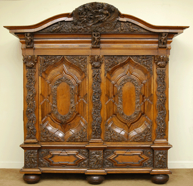 A North European baroque carved and veneered walnut shrank fetched $40,250.