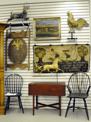 A good selection of Americana included three weathervanes †the horse and sulky at $10,350, the leaping stag vane at $9,200 and a large rooster vane for $4,025 †as well as the continuous arm Windsor in a dark green paint that sold at $4,025 and the trade sign at $1,495.