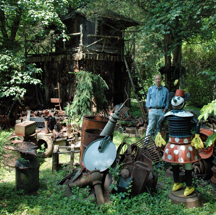 "Iron Minnie †Queen of the Junkyard,†67 inches high, 2003, watches over the iron inventory while Joel is not around.