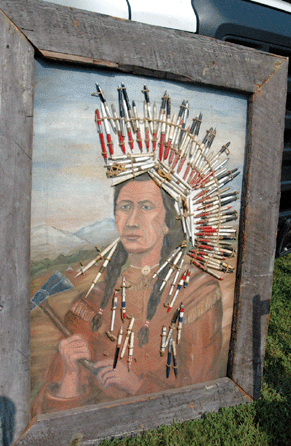 While early Americans used quills to write with, the folk artist who made this "Chief†portrait used 1940s pens to create his headdress. Dolce, West Palm Beach, Fla. ⁈eart-O-The-Mart