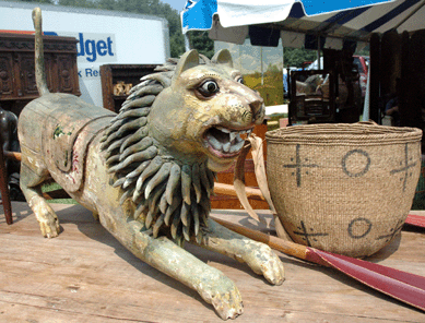 A rare hand carved carousel lion from the turn of the century scared up lots of interest at North River Auction Gallery, Saugerties, N.Y., with its old paint decoration. ⁄ealer's Choice
