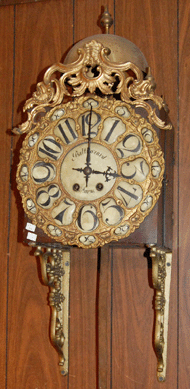 The Nineteenth Century gilt wall clock by Balthazard realized $560.