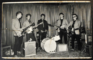 One of Eric Caren's favorite subjects is the Beatles. This, the first photograph of the then-called Silver Beatles, shows the band with a fifth member, bassist Stu Sutcliffe, and Pete Best on drums.