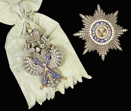 This Russian enameled gold and silver gilt paste set, Badge and Star of the Order of St Andrew, sold for $135,700.