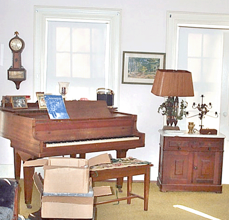 A banjo clock, shown upper left, was one of two wall clocks reported stolen.