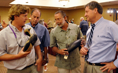 Frank Schmidt, right, answers questions from collectors.