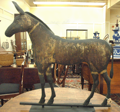 The rare American mule copper weathervane, circa late Nineteenth/early Twentieth Century, was restoration-free with a dark mottle patina over the original gilded surface. Estimated $20/30,000, it stubbornly held off until $117,300 was attained.