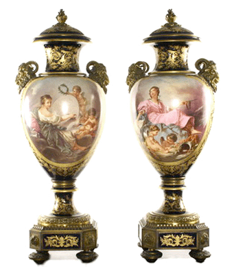 A monumental pair of Sevres architectural scale urns realized $79,750.