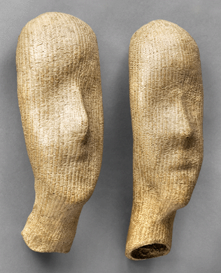 Nagakura Ken'ichi (b 1952), left: "Face I,†2007, bamboo, lacquer and powdered polishing stone and clay, 19 by 7 by 4 inches; right: "Face II,†2007, bamboo, lacquer and powdered polishing stone and clay, 16½ by 5½ by 5½ inches. Anne and Arnold Porath collection. ⁓usan Einstein photo