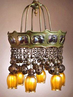 Turtleback chandelier, circa 1905, blown glass, bronze with pressed glass, 49 inches high by 18 inches diameter, Tiffany Studios, New York. Neustadt Collection of Tiffany Glass, Long Island City, N.Y.