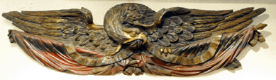 The Nineteenth Century carved sternboard eagle with banner sold for $183,000.