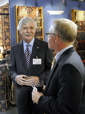 William Vareika chats with a client during preview.