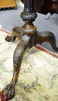 A gem in the rough was also plucked from the sale as a rare Philadelphia tilt-top tea table was offered. The heavily carved Chippendale table base was virtually identical to an example illustrated in American Furniture in the Metropolitan Museum by Morris Heckscher. Despite the replaced top, the table, circa 1770, sold at $28,750.