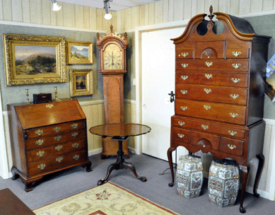 The slant front desk sold at $4,600, the tall case clock by John Bailey, Lynn, Mass., $19,550, and the highboy brought $14,950.