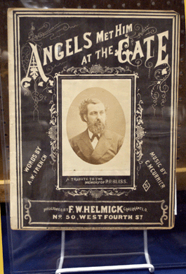 John Waite Rare Books, Ascutney, Vt., showed this musical tribute to Phillip Bliss, a hymn writer who died in a train wreck. Bliss was an important figure in the development of gospel music and the item is noteworthy as it is rare to have an albumen photograph mounted on sheet music.