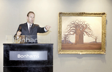 Giles Peppiatt, head of South African art at Bonhams, takes bids on the record-breaking work by Jacob Hendrik Pierneef.