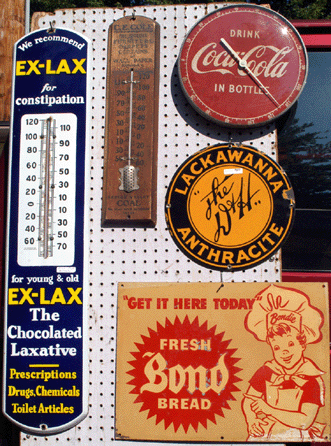 Colorful advertising signs at Gerald and Carol Newman, New Milford, Conn. ⁍ay's