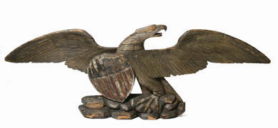Carved sternboard eagle with shield sold for $28,600.