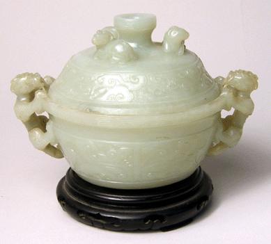 A celadon-green, dragon-carved jade censer estimated at $600․1,200 brought $16,520.