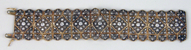 A lacy diamond-encrusted Buccellati bracelet pushed past its $1,5/2,500 estimate to realize $11,210.
