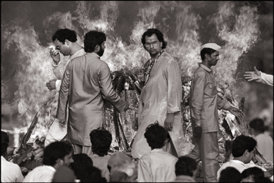 Raghu Rai, "Rajiv Gandhi at the Funeral Pyre of his Mother, Indira Gandhi,†1984; black and white photograph, courtesy the artist.