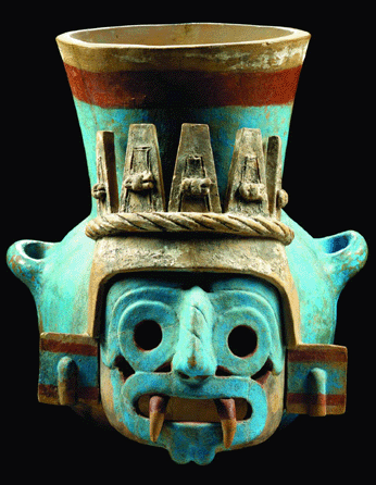 A ceramic vessel in the form of Tlaloc, the god of rain, water and fertility, shows him with a crown of heron feathers, fanged teeth and goggle eyes. He had the ability to cast lightning bolts to cause illness.