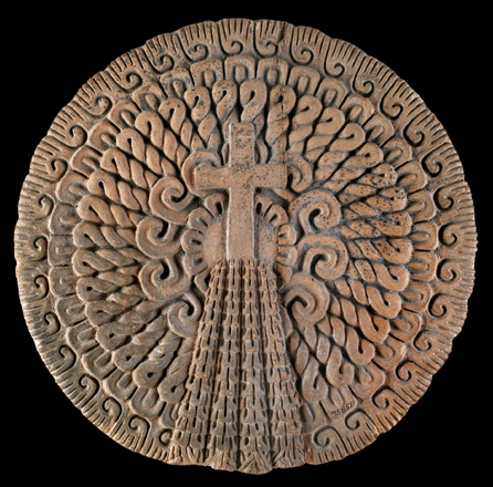 This ceramic disk from the early colonial period combines Aztec and Spanish design motifs. It may represent a Christian cross placed on top of an Aztec pyramid. 