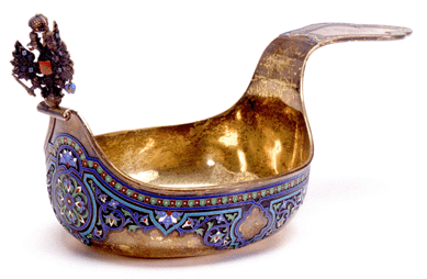 A large Russian enameled silver presentation kovsh with the flattened handle inscribed "St Petersburg, 1892†was marked with Gratchev maker's marks. Cataloged as Twentieth Century, the lot soared past the $2,5/3,500 estimate, hammering down at $109,000.