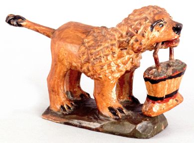 A high estimate of $60,000 was on this Wilhelm Schimmel carved and painted dog clutching a basket, 5 inches high, 7½ inches long, that sold to Harry Hartman for $140,400.