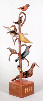 This carved and painted bird tree, one of three in the sale, "Schtockschnitzler†Simmons (Berks County, Penn., active 1885‱910), 19¼ inches tall with nine polychromed birds, sold to dealer David Wheatcroft for $76,050, over the high estimate of $50,000. "It's about the best, with nine birds, two of them of large size,†David said after the auction.