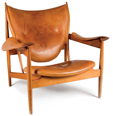 Finn Julh (Danish, 1912‱989), Chieftain Chair, designed in 1949, produced by Niels Vodder, fetched $28,125.