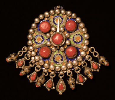 Fibula (tabzimt), Aït Yenni peoples, Great Kabylie, Algeria, late Nineteenth Century, silver, coral, enamel.