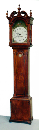 A tall case clock by Daniel Rose (1749‱827) of Reading, Penn., struck the day's top price, $18,975. With Chippendale form, the walnut relief carved example stood 7 feet 11 inches high.