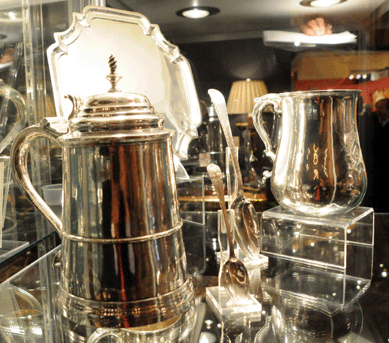 A selection of Boston silver from the booth of Robert Lloyd, New York City. The tankard was by Daniel Parker, the cann by Joseph Foster, the salver by William Swan, and the two spoons by Paul Revere.